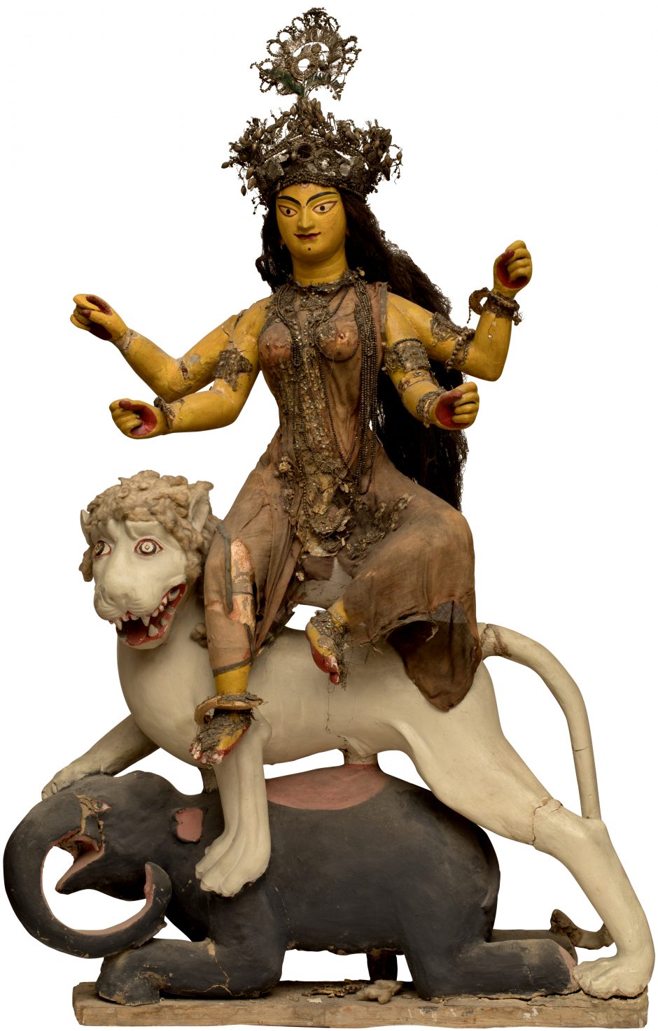 Figure of the goddess Durga with four arms sitting on a lion and an elephant