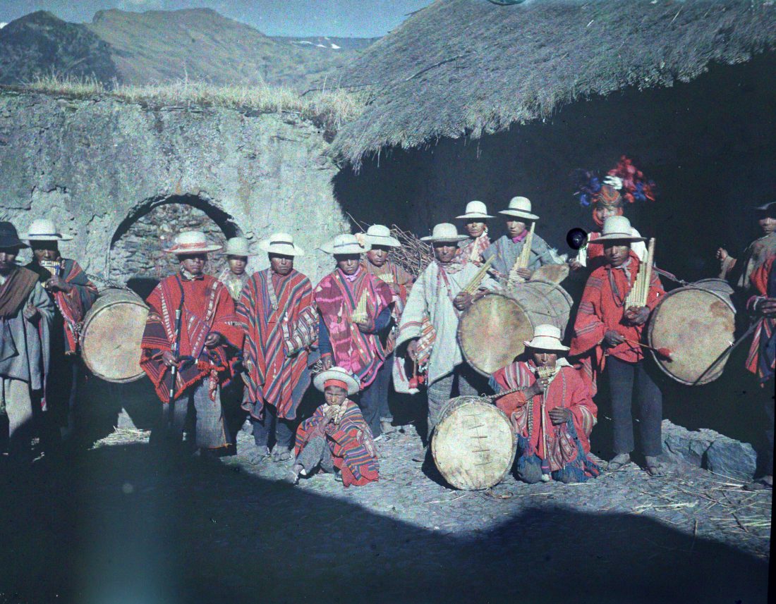 Festival, Bolivia, group, garb, musical instruments, drums, flutes, village, mountains, hats, poncho