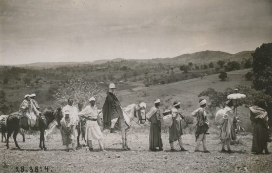 Caravan, woman, Ethiopia, journey, visiting trip, rider, porter, horses, sunshade, baggage, hillscape 