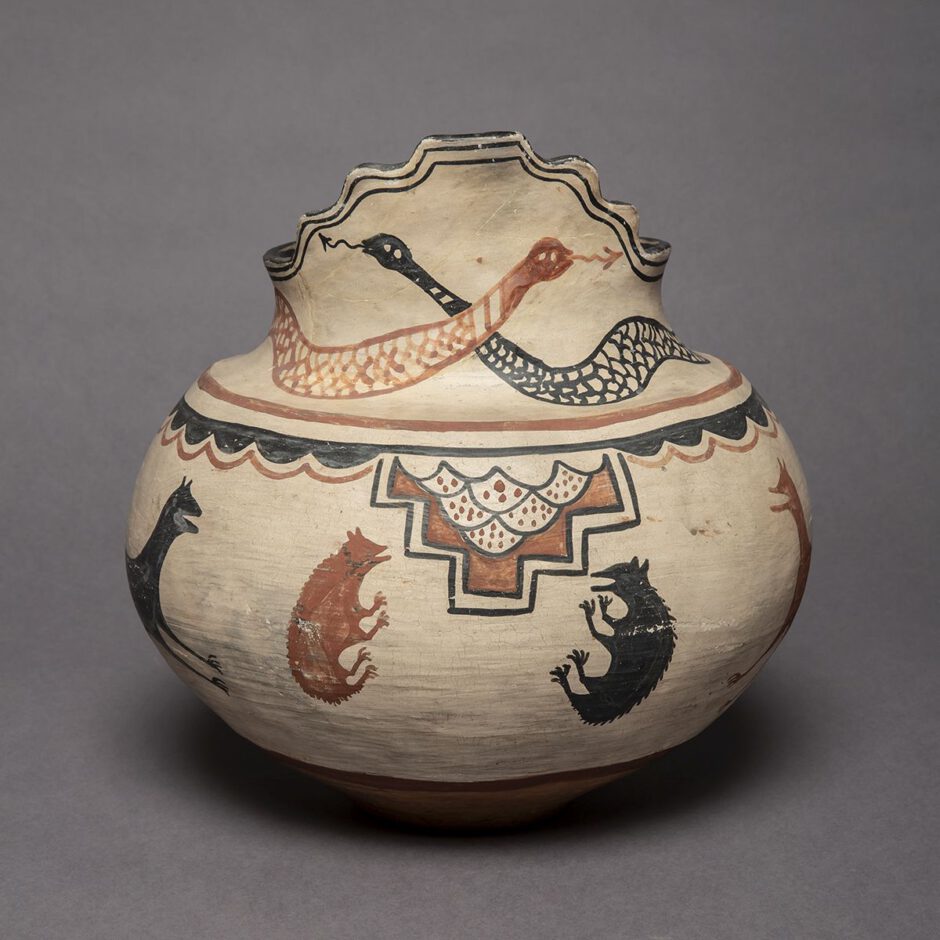 Pseudo ceremonial clay vessel with snake motif and stepped rim