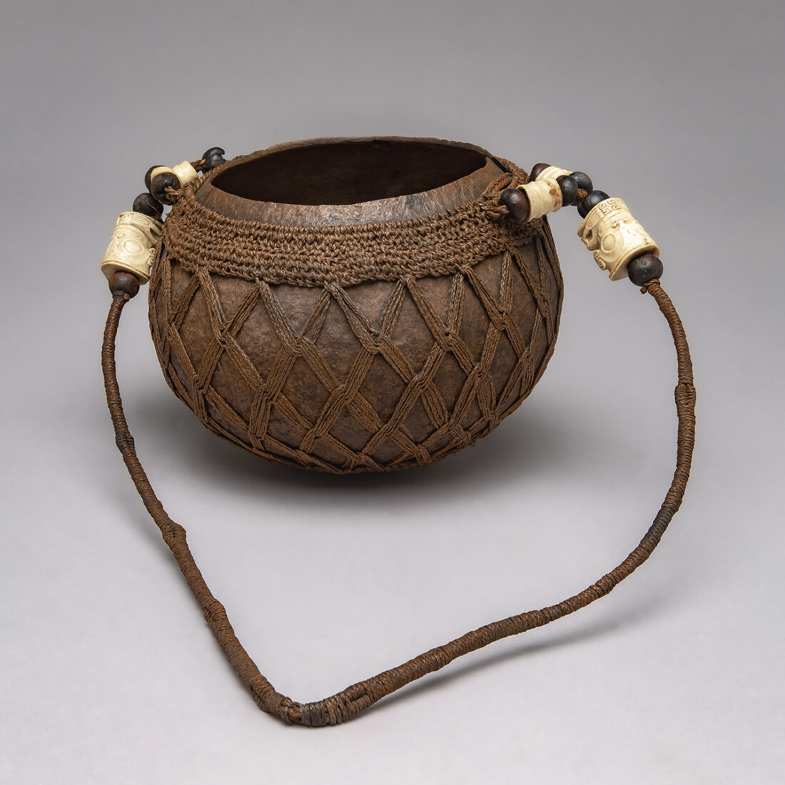 Water vessel with decorative carvings, Marquesas Islands, before 1960, Pacific Ocean