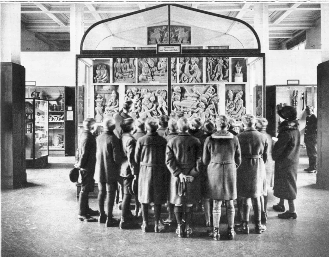 Group of children, showcase, Indonesia exhibition hall, b/w photograph
