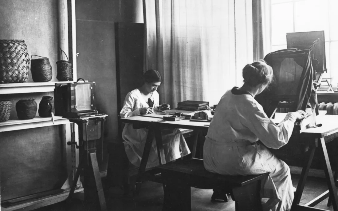 View of the photo studio, photographers at work, b/w photograph
