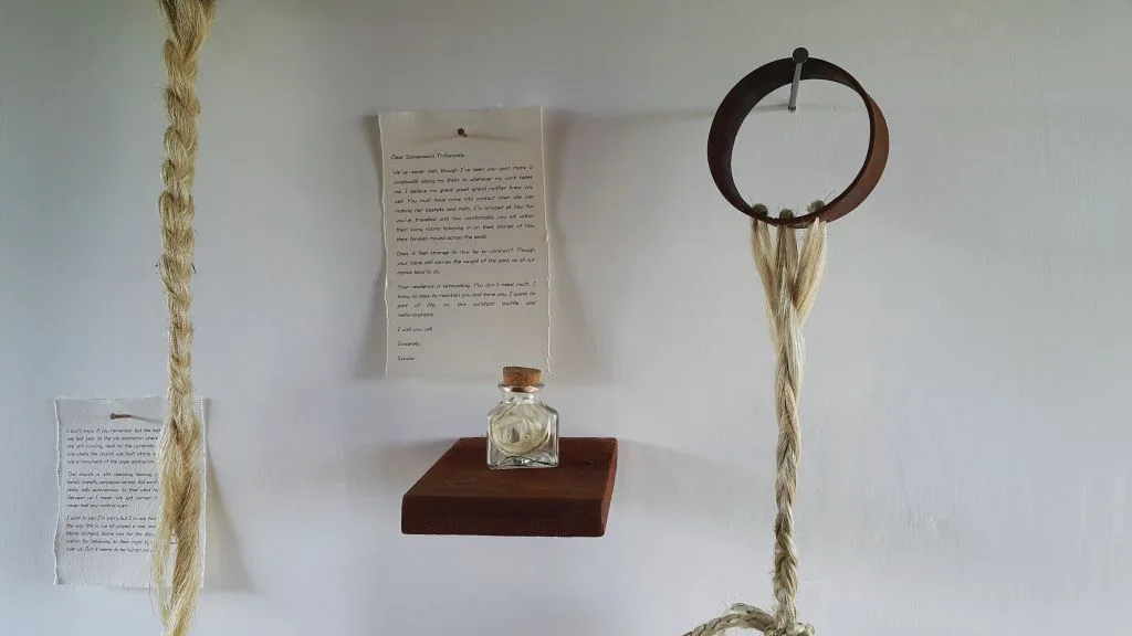 The Green Gold, rusty soft steel, ink, glass bottle, nails, video projection, sound via headphones, 
