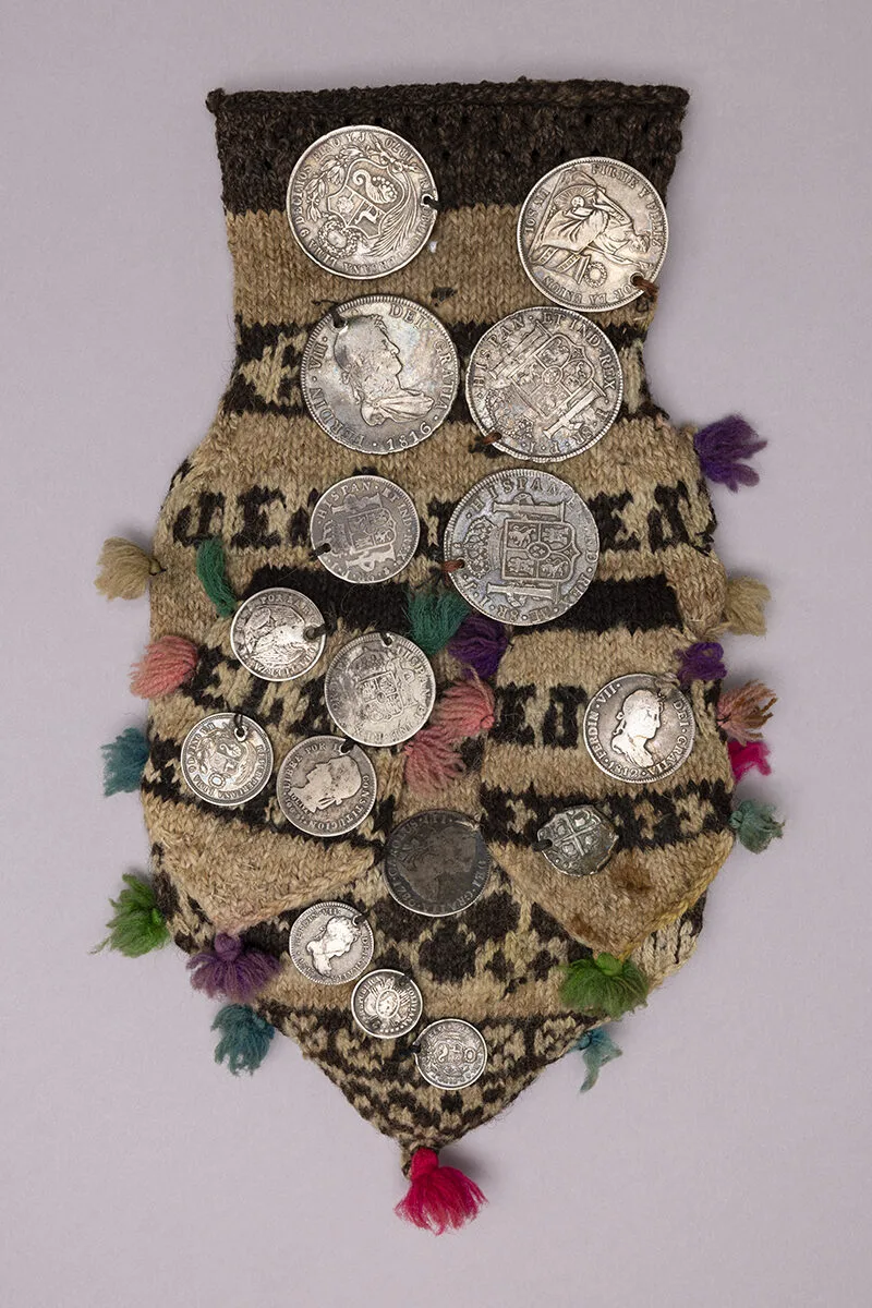 Knitted purse with silver coins 